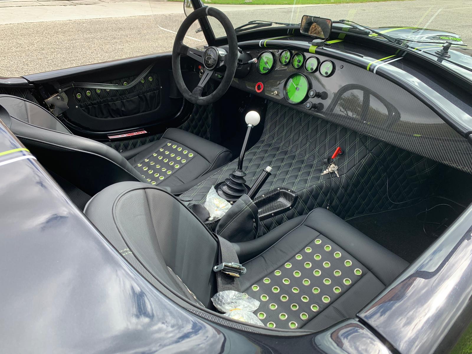 Backdraft interior - green stitched leather