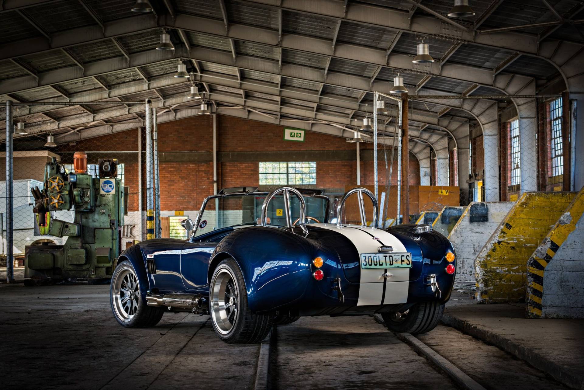 Backdraft Cobra Roadster in navy blue with white racing stripe